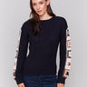 Navy blue long-sleeve sweater with detailed crochet pattern on the sleeves by Charlie B.