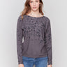 Charcoal animal print sweater with batwing sleeves and a relaxed fit by Charlie B.