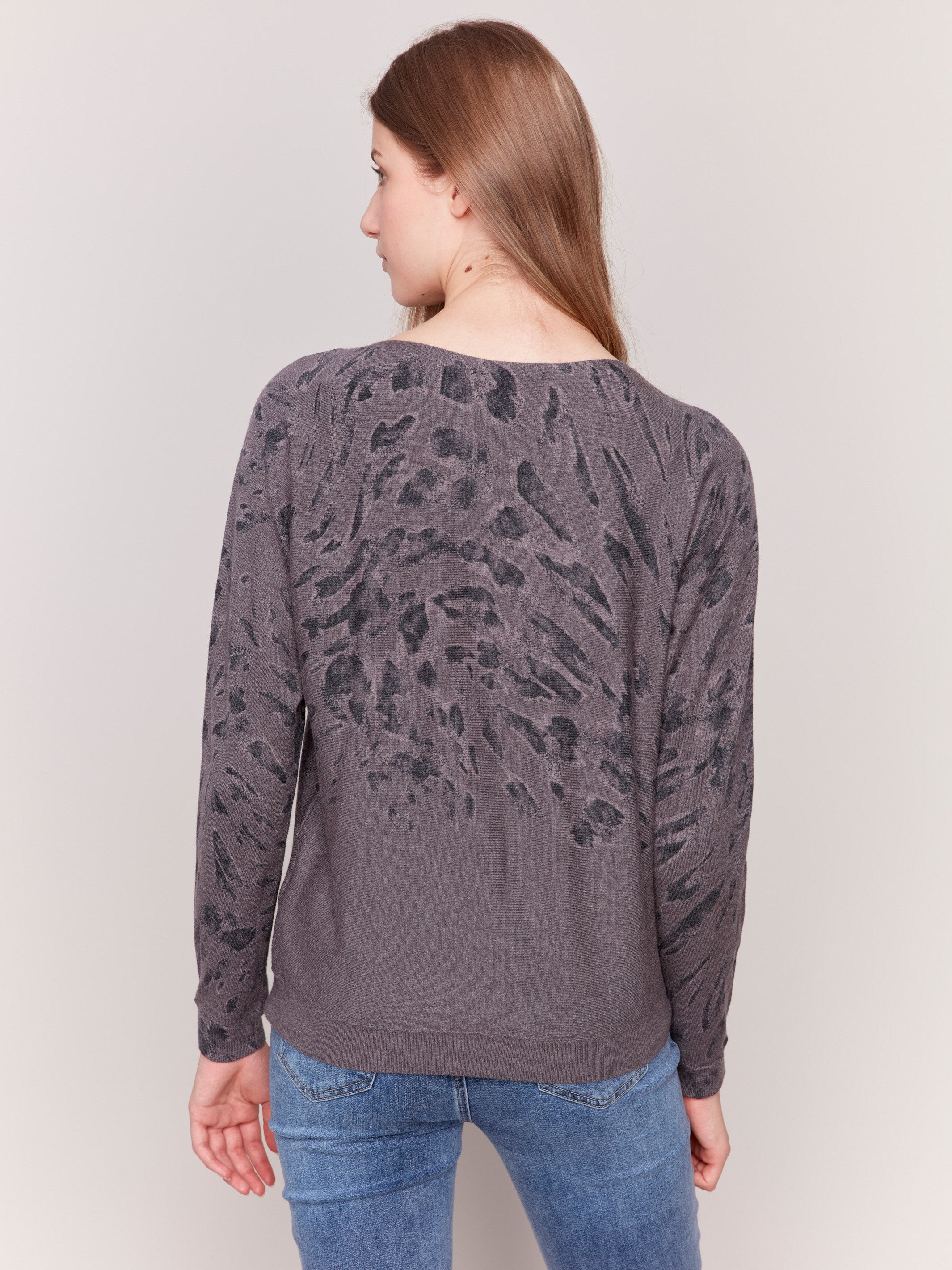 Charcoal animal print sweater with batwing sleeves and a relaxed fit by Charlie B.