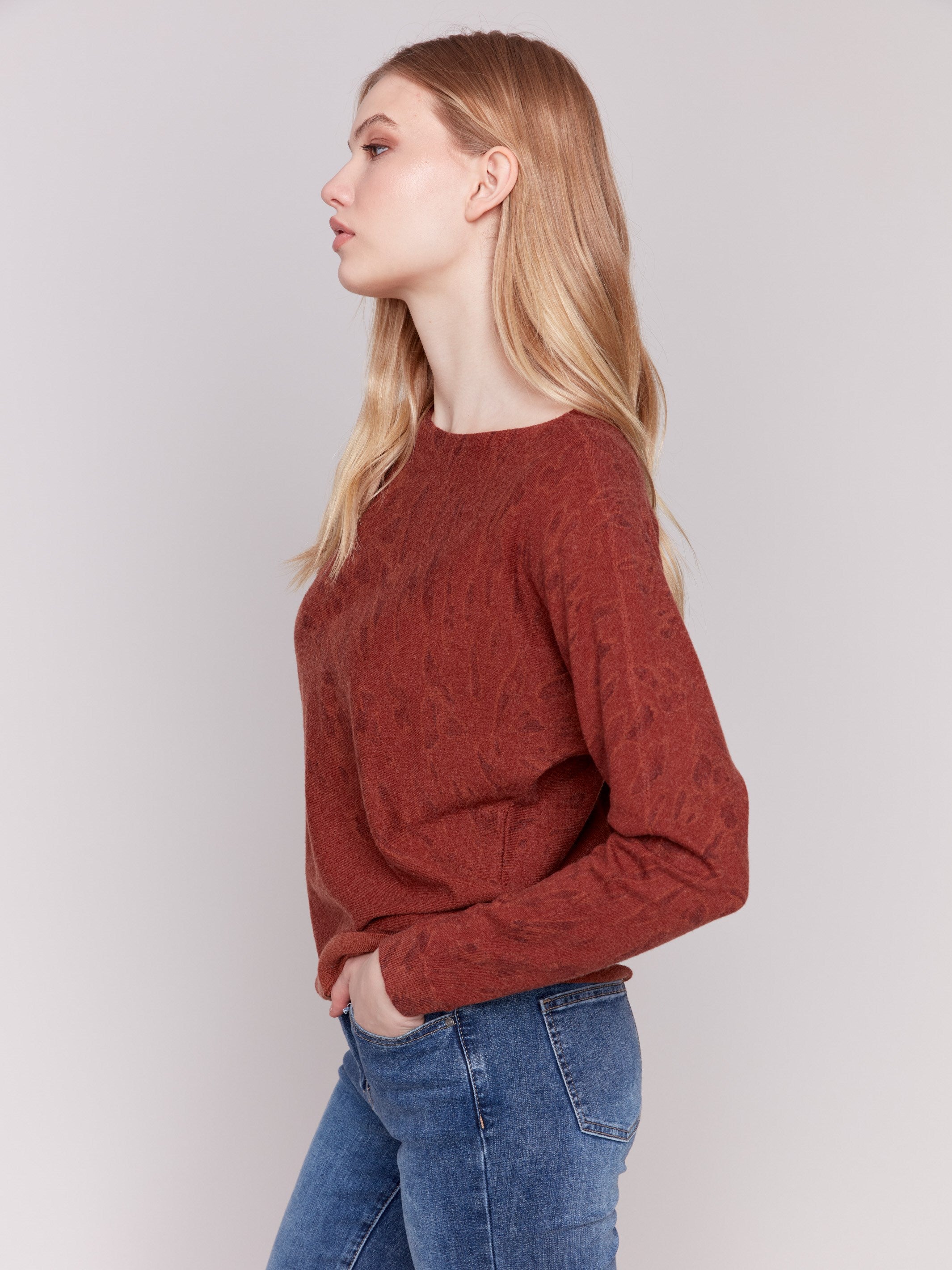 Terracotta animal print sweater with batwing sleeves and a relaxed fit by Charlie B.