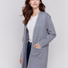 Grey long cardigan with white blanket stitch trim, featuring patch pockets and an open front by Charlie B.