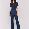 Dark blue bootcut jeans with a five-pocket design and button fly, perfect for casual or dressy occasions by Charlie B.