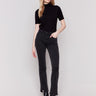 Charcoal black bootcut jeans with front slits, regular rise, and a five-pocket design by Charlie B.