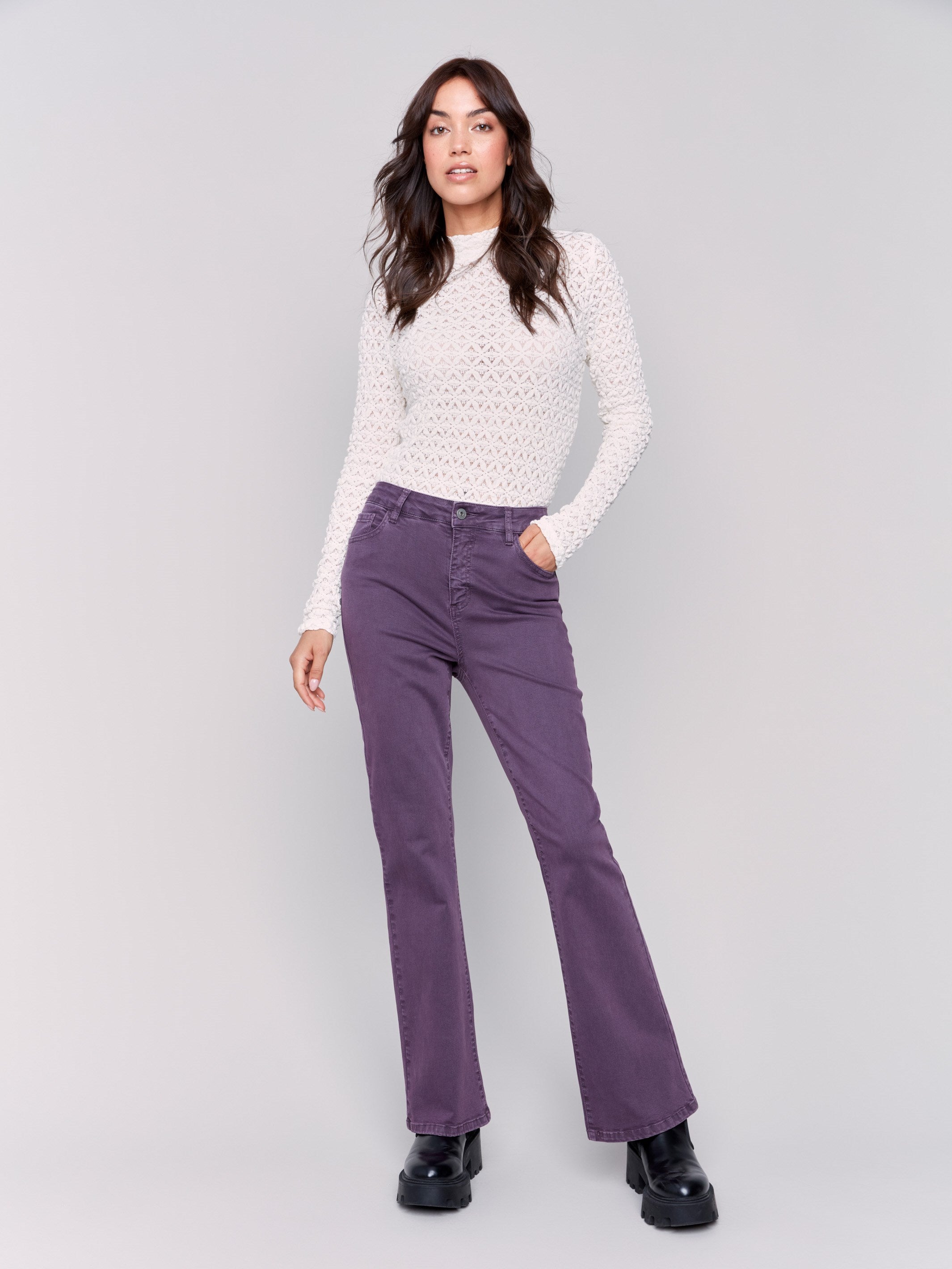 Plum bootcut twill pants with a mid-rise and bootcut fit, showcasing five-pocket design by Charlie B.