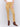 Amber yellow bootcut twill pants with an asymmetrical fringe hem and mid-rise waist by Charlie B.