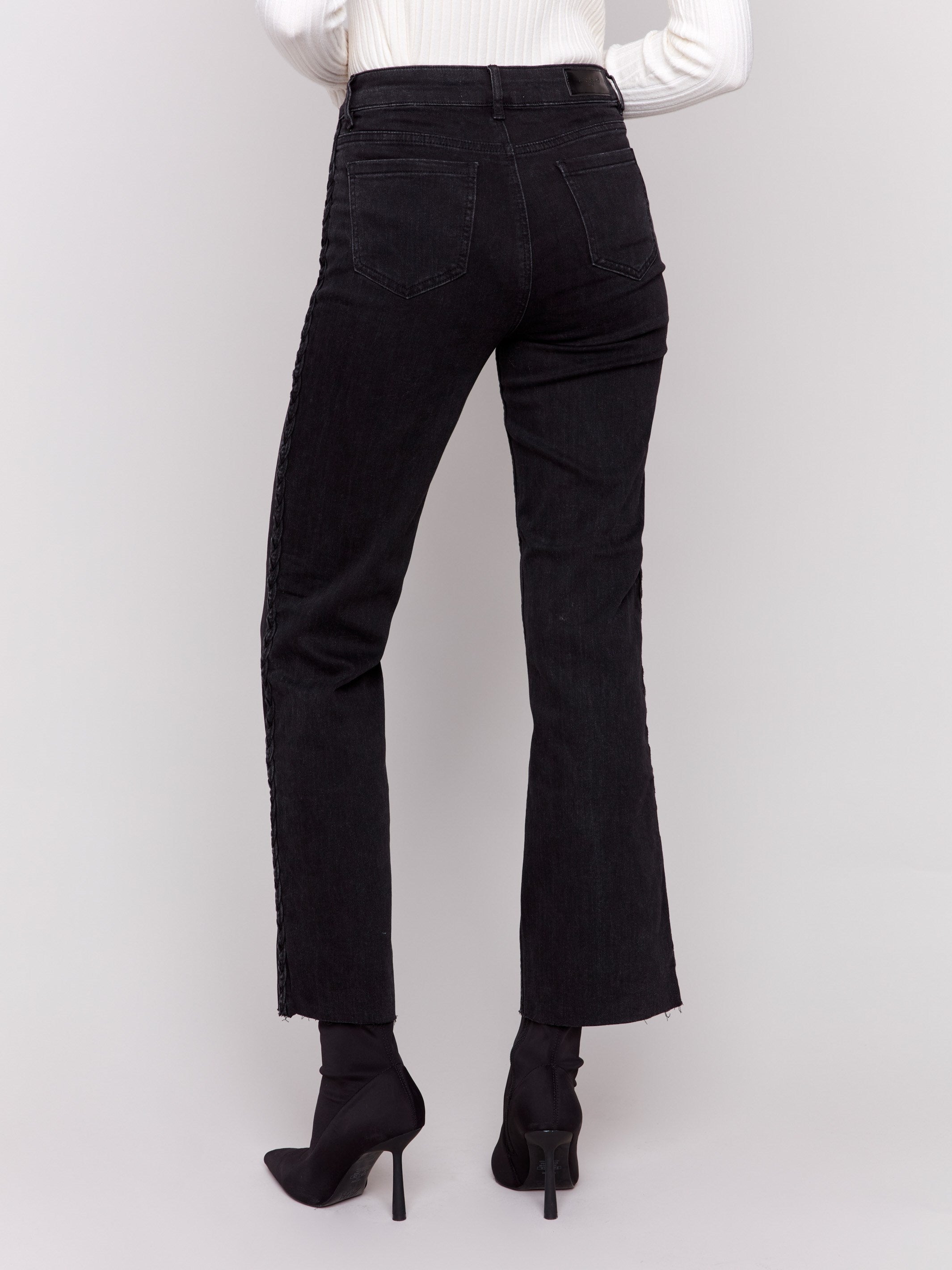 Women's charcoal black braided side seam jeans with regular rise and straight leg, shown with five-pocket design by Charlie B.