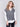 Grey soft touch sweater vest with a V-neck and relaxed fit, perfect for layering by Charlie B.