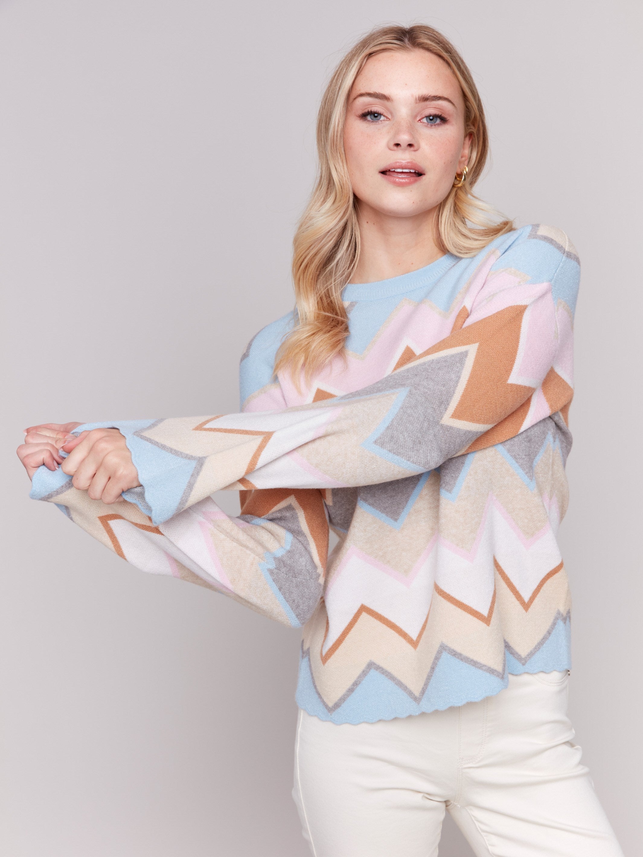 Colorful chevron stripe sweater with bell sleeves and a crew neckline by Charlie B.