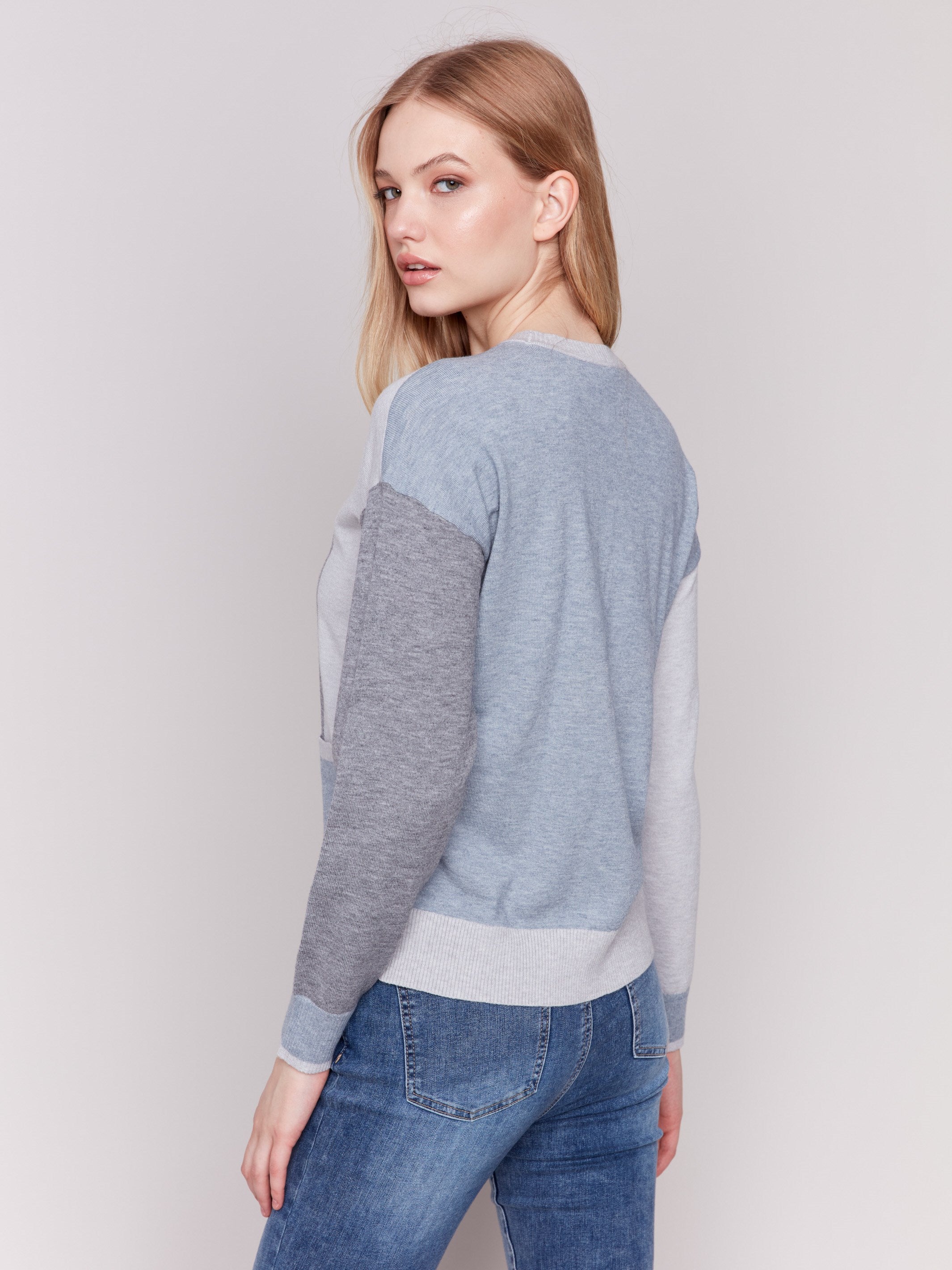 Sweater with heather grey color block design and patch pocket by Charlie B.