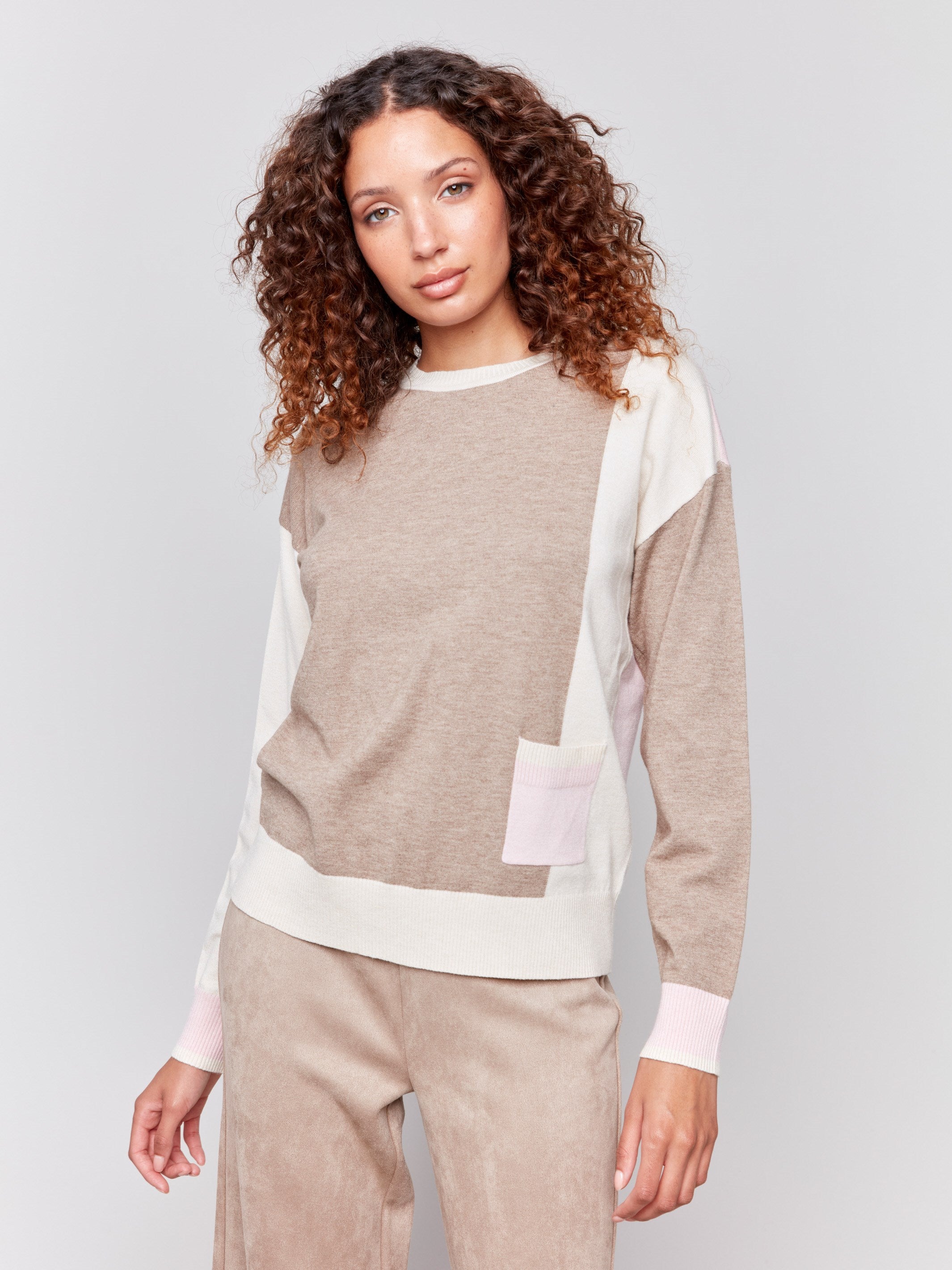 Sweater with color block design and patch pocket by Charlie B.