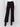 High-rise black crepe flare pants featuring decorative buttons along the waistline; sleek, elegant design perfect for formal and casual occasions, by Charlie B.