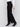 High-rise black crepe flare pants featuring decorative buttons along the waistline; sleek, elegant design perfect for formal and casual occasions, by Charlie B.