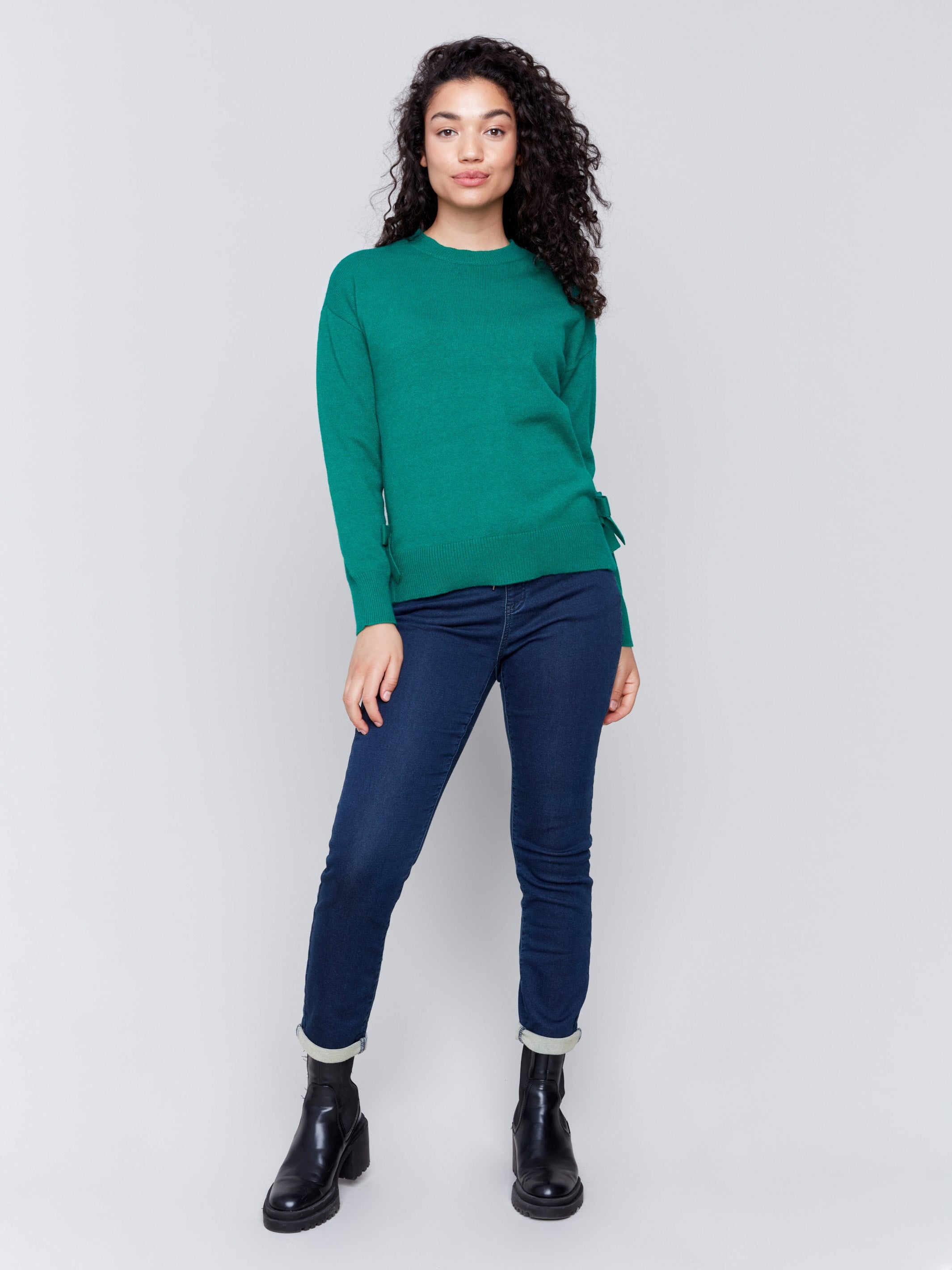 Forest green long-sleeve crew neck sweater with side bow details by Charlie B.