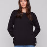 Black long-sleeve crew neck sweater with side bow details by Charlie B.