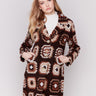 Chocolate crochet coat with colorful geometric patterns, featuring a front button closure and side welt pockets by Charlie B.