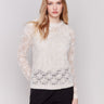 Oatmeal beige crochet knit sweater with a round neckline and drop shoulders by Charlie B.