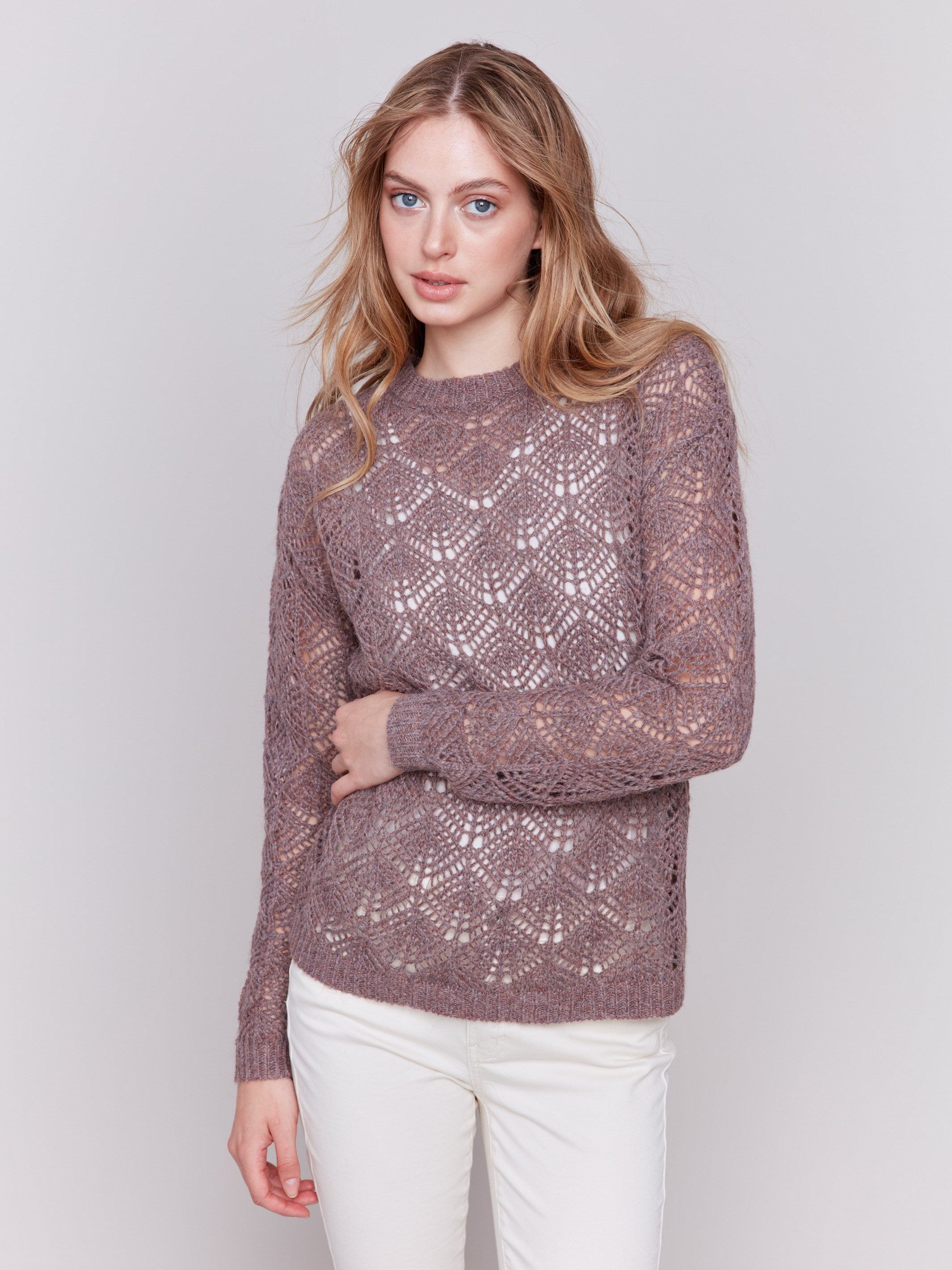 Taupe crochet knit sweater with a round neckline and drop shoulders by Charlie B.