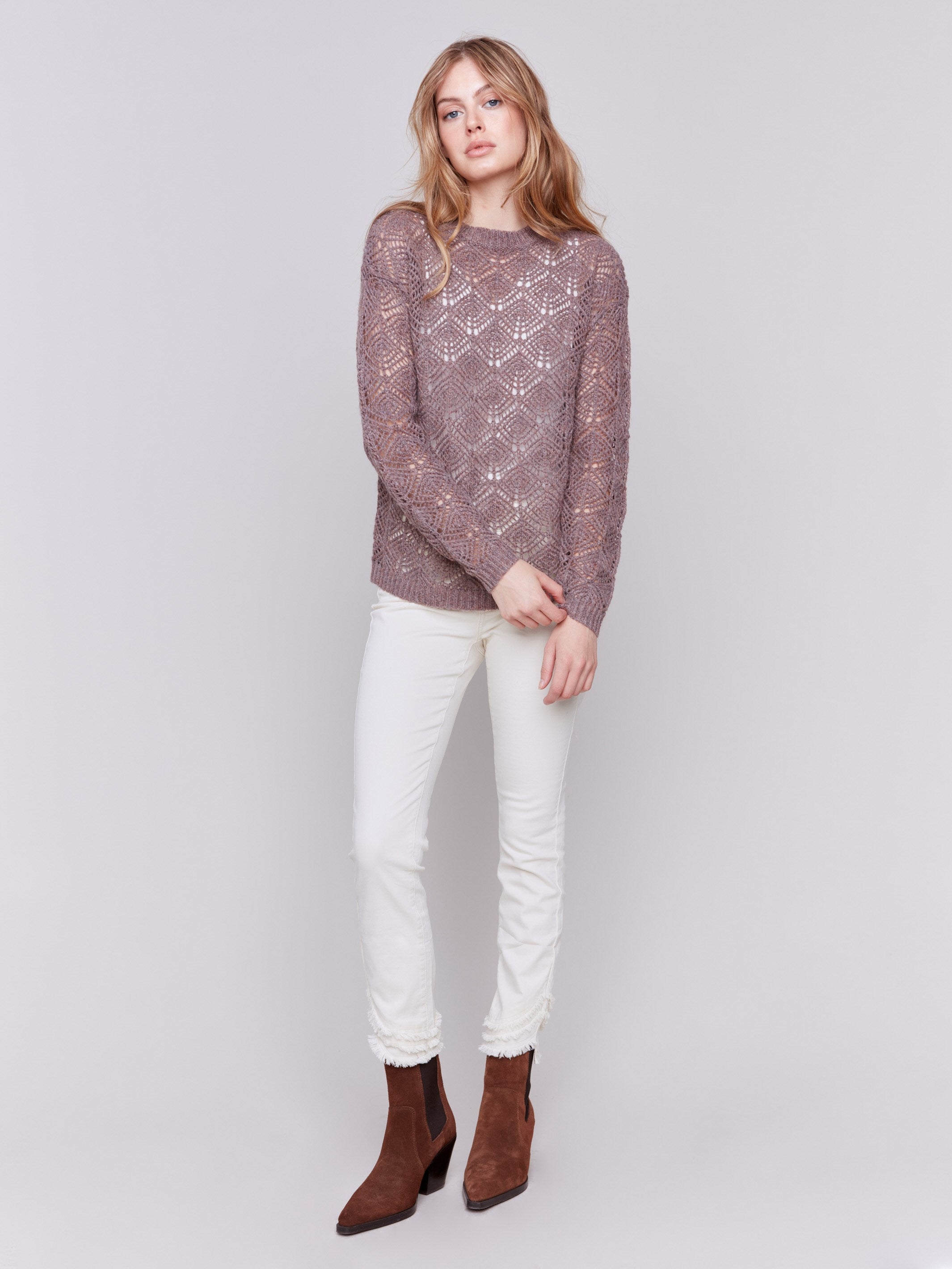 Taupe crochet knit sweater with a round neckline and drop shoulders by Charlie B.