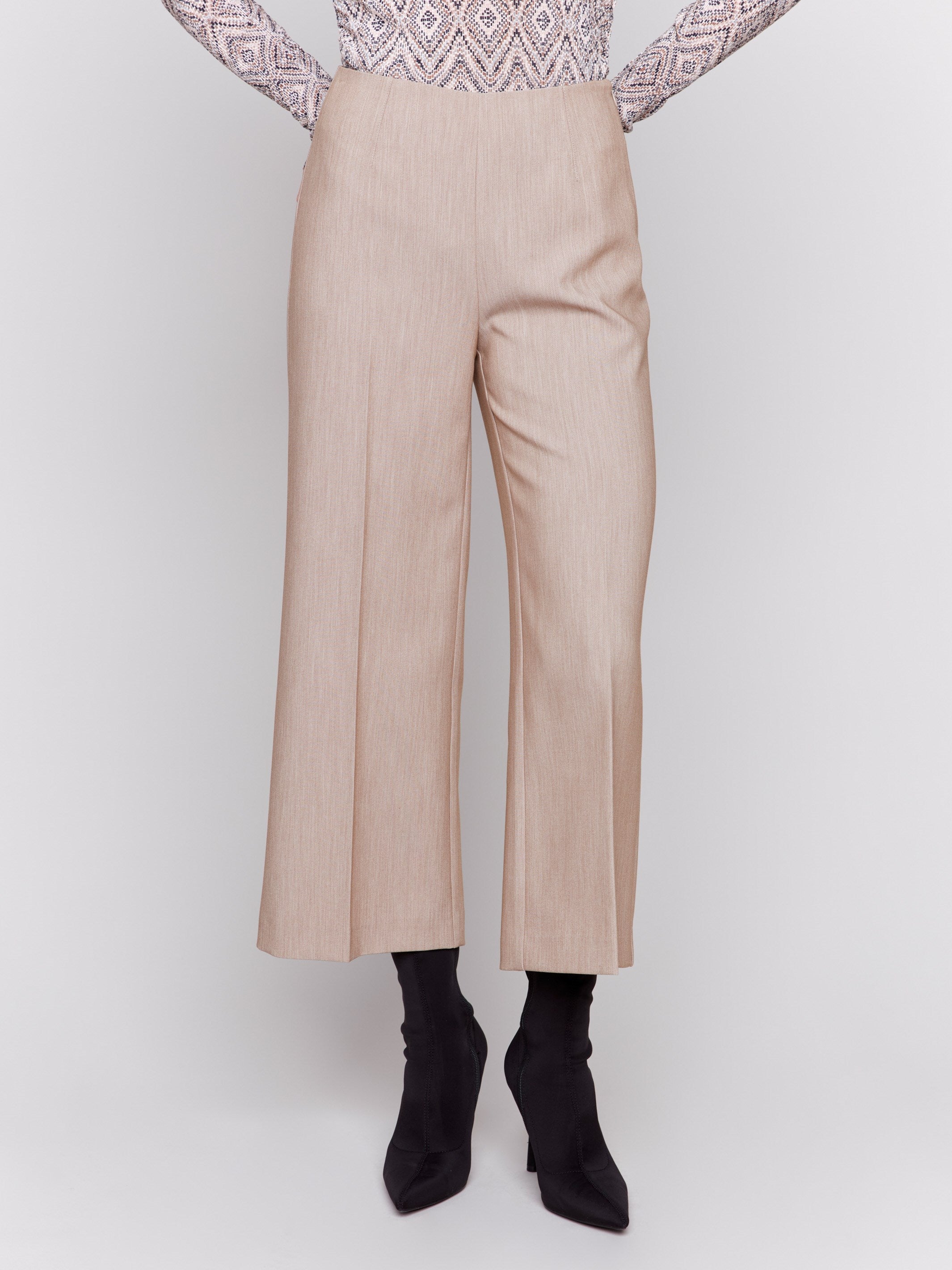 Beige cropped wide-leg pants with a side zipper closure by Charlie B, perfect for professional or casual settings.