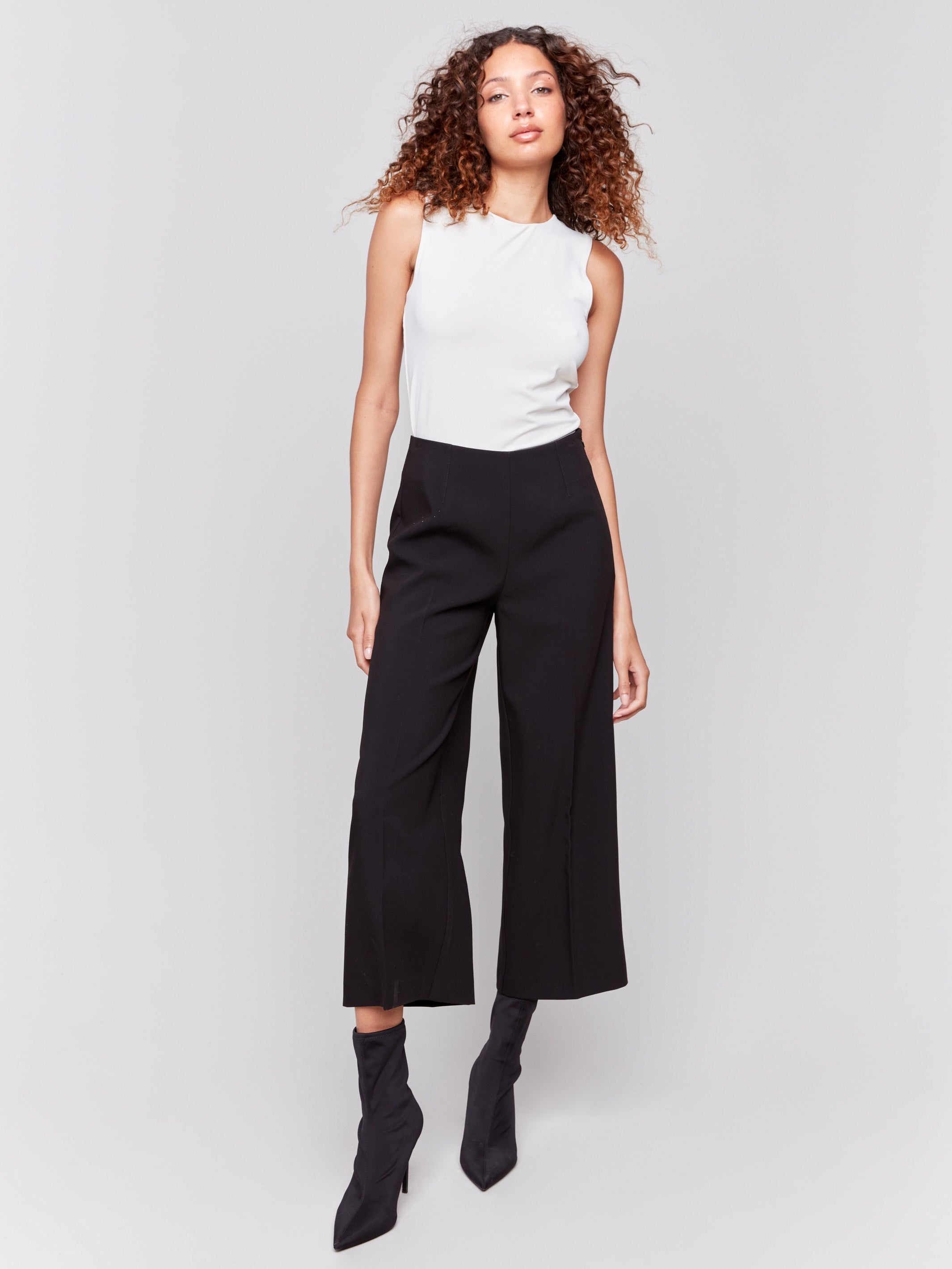 Black cropped wide-leg pants with a side zipper closure by Charlie B, perfect for professional or casual settings.