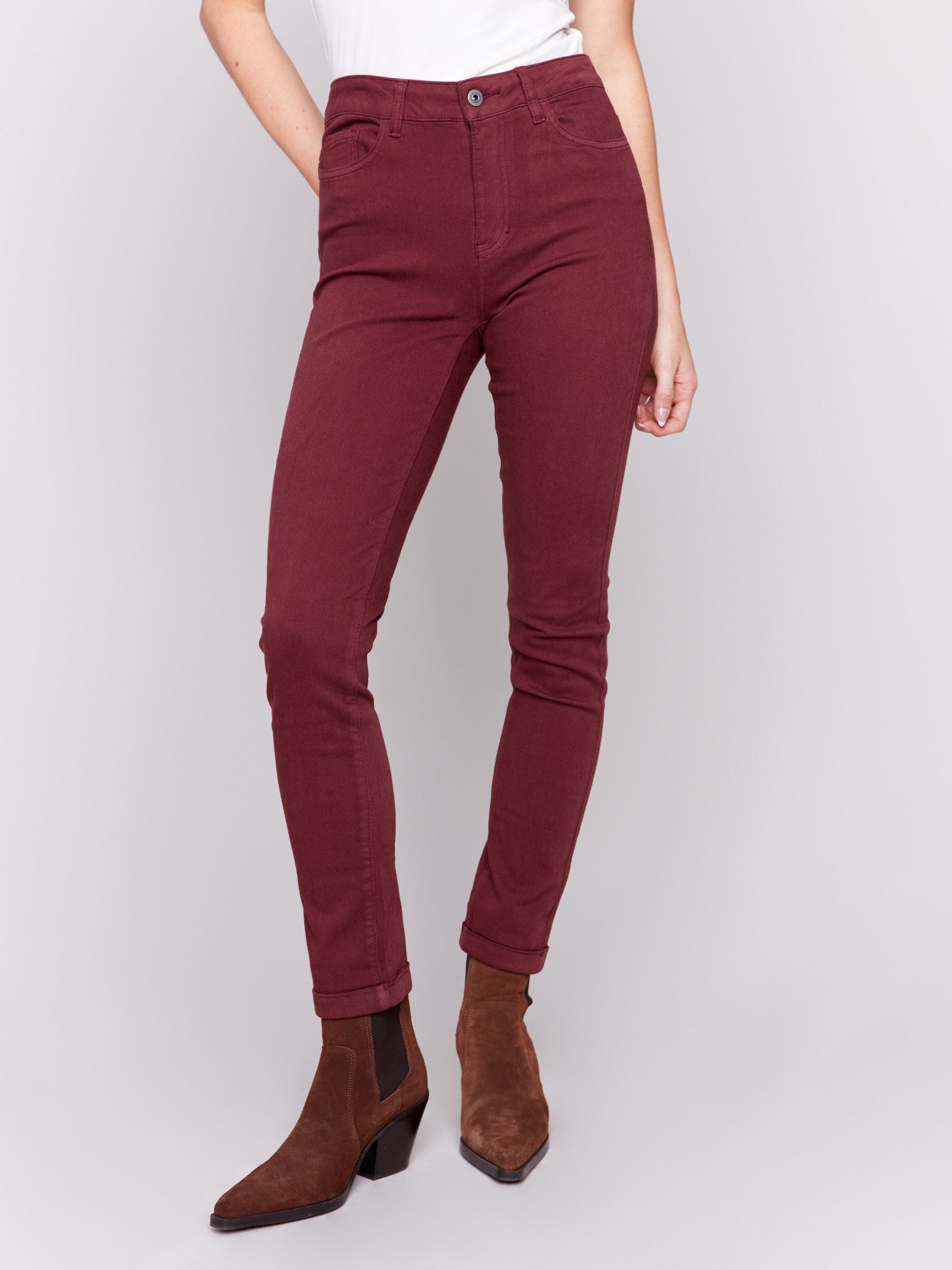 Cabernet red slim-leg twill jeans with a cuffed hem and a classic five-pocket design by Charlie B.