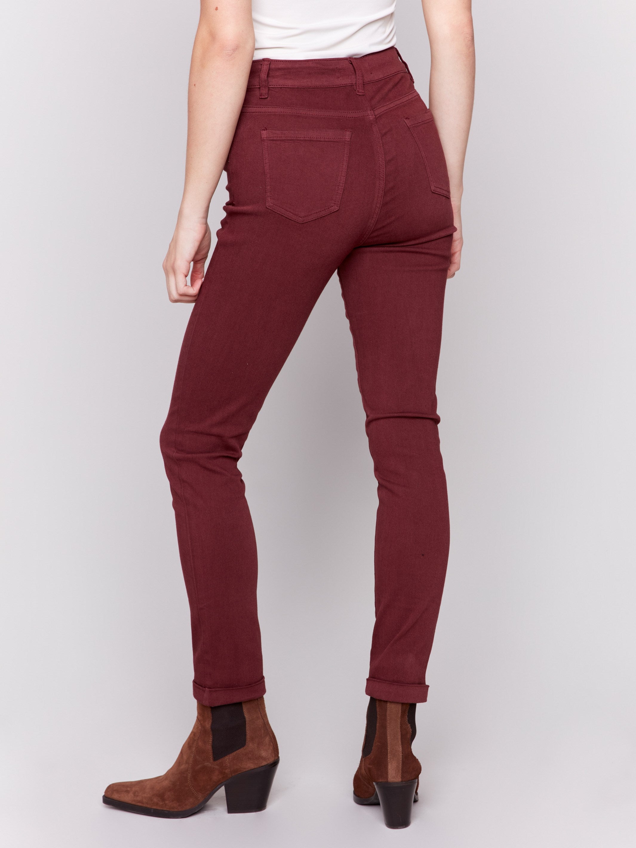 Cabernet red slim-leg twill jeans with a cuffed hem and a classic five-pocket design by Charlie B.