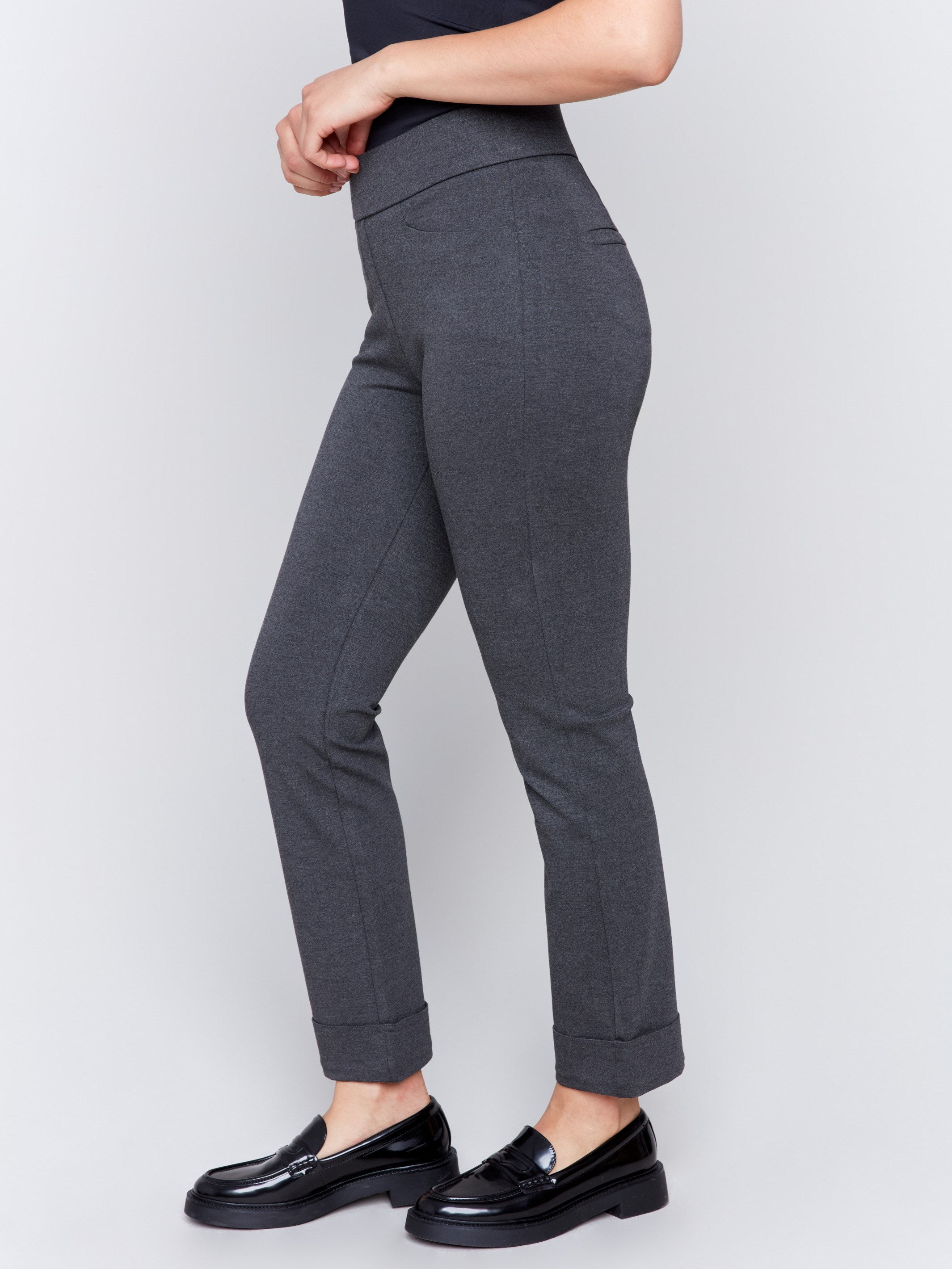 Charcoal grey cuffed ponte pants featuring a straight leg fit, with welt pockets and a cuffed hem by Charlie B.