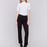 Black cuffed ponte pants featuring a straight leg fit, with welt pockets and a cuffed hem by Charlie B.