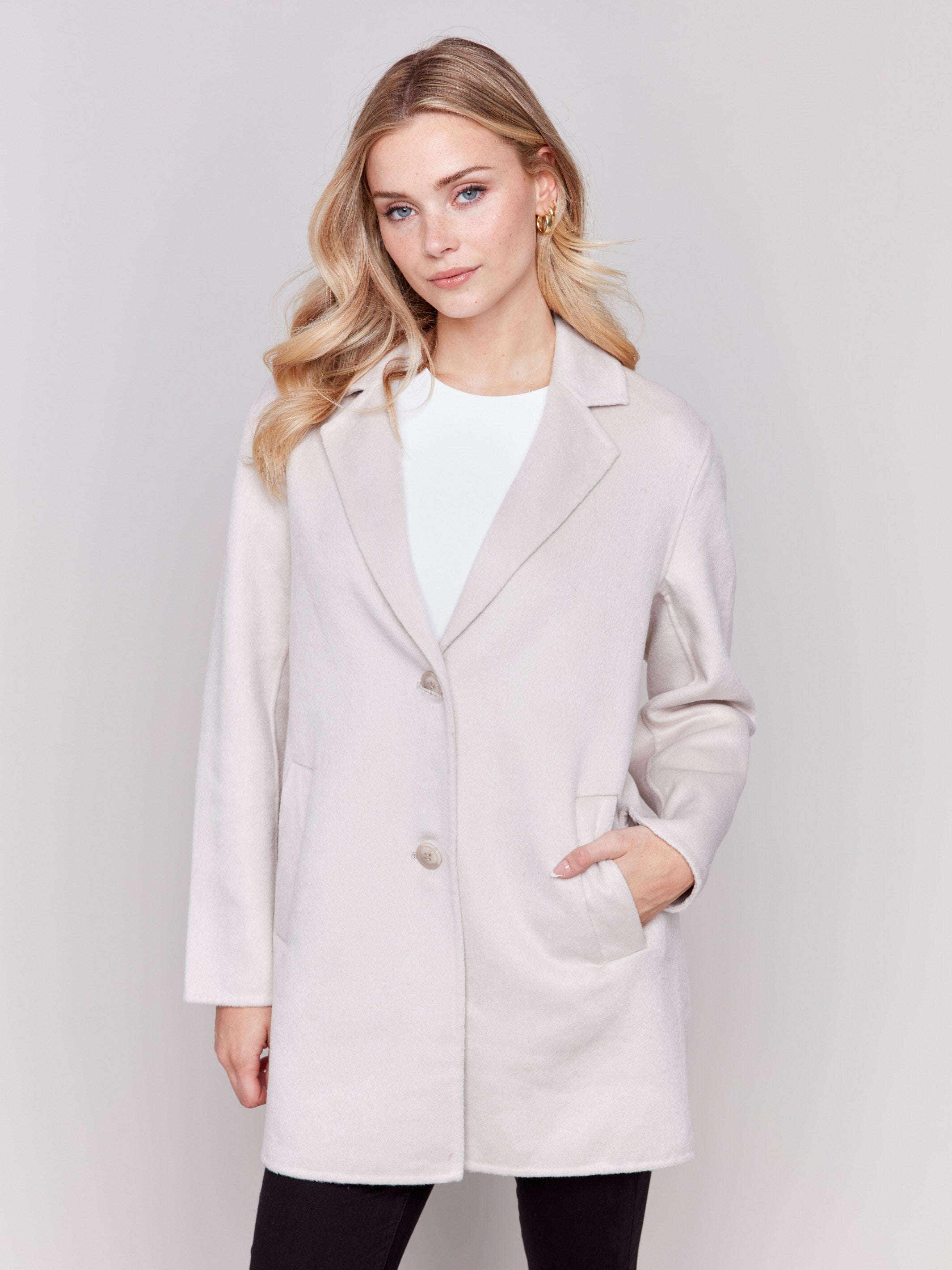 Light almond double-faced wool coat with notch lapel collar, two-button closure, and two front pockets for women by Charlie B.