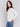 White sweater with floral embroidery, long sleeves, and a round neckline by Charlie B.