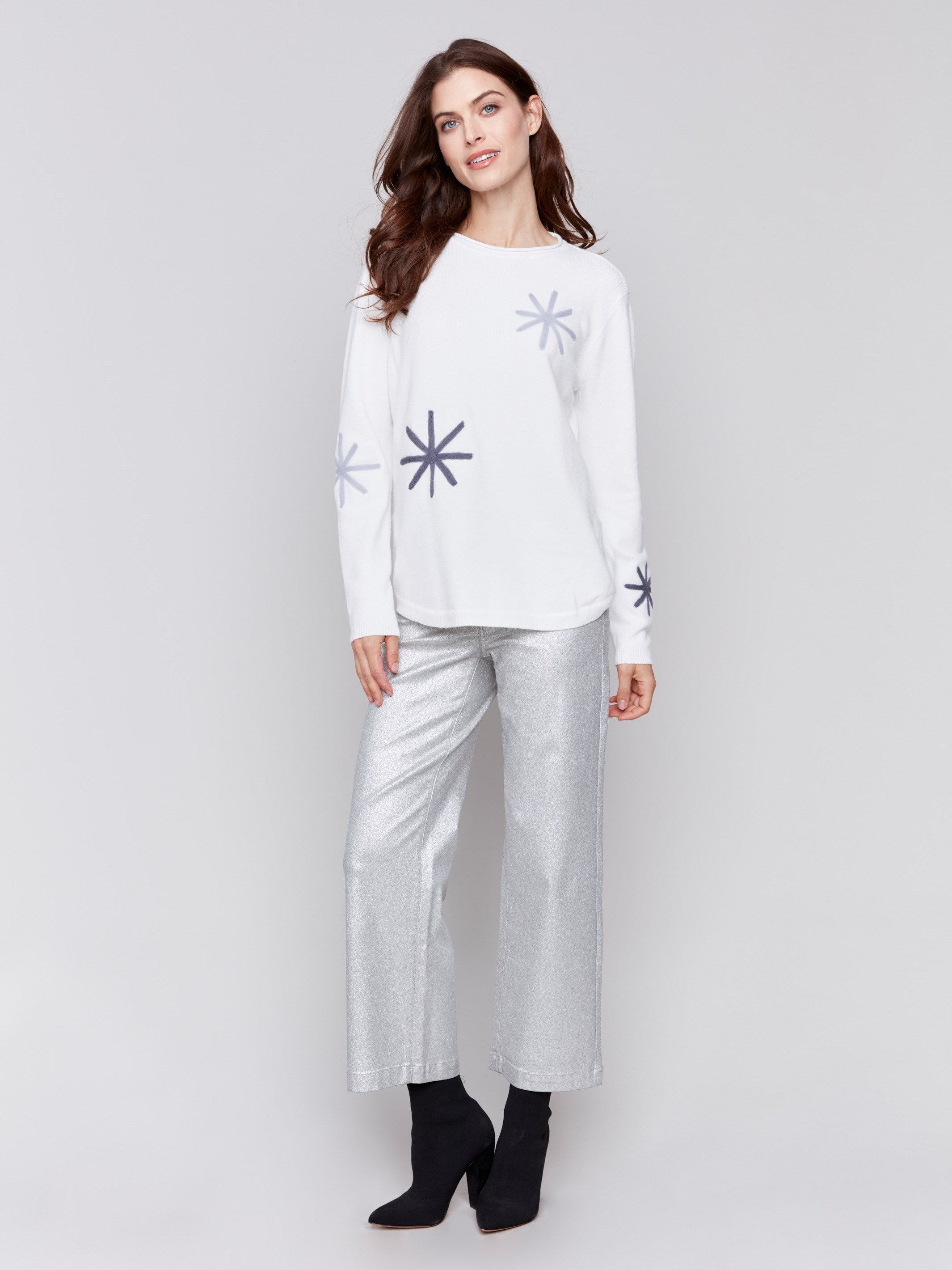 Ecru whitelong-sleeve sweater with snowflake embroidery and rounded hem by Charlie B.