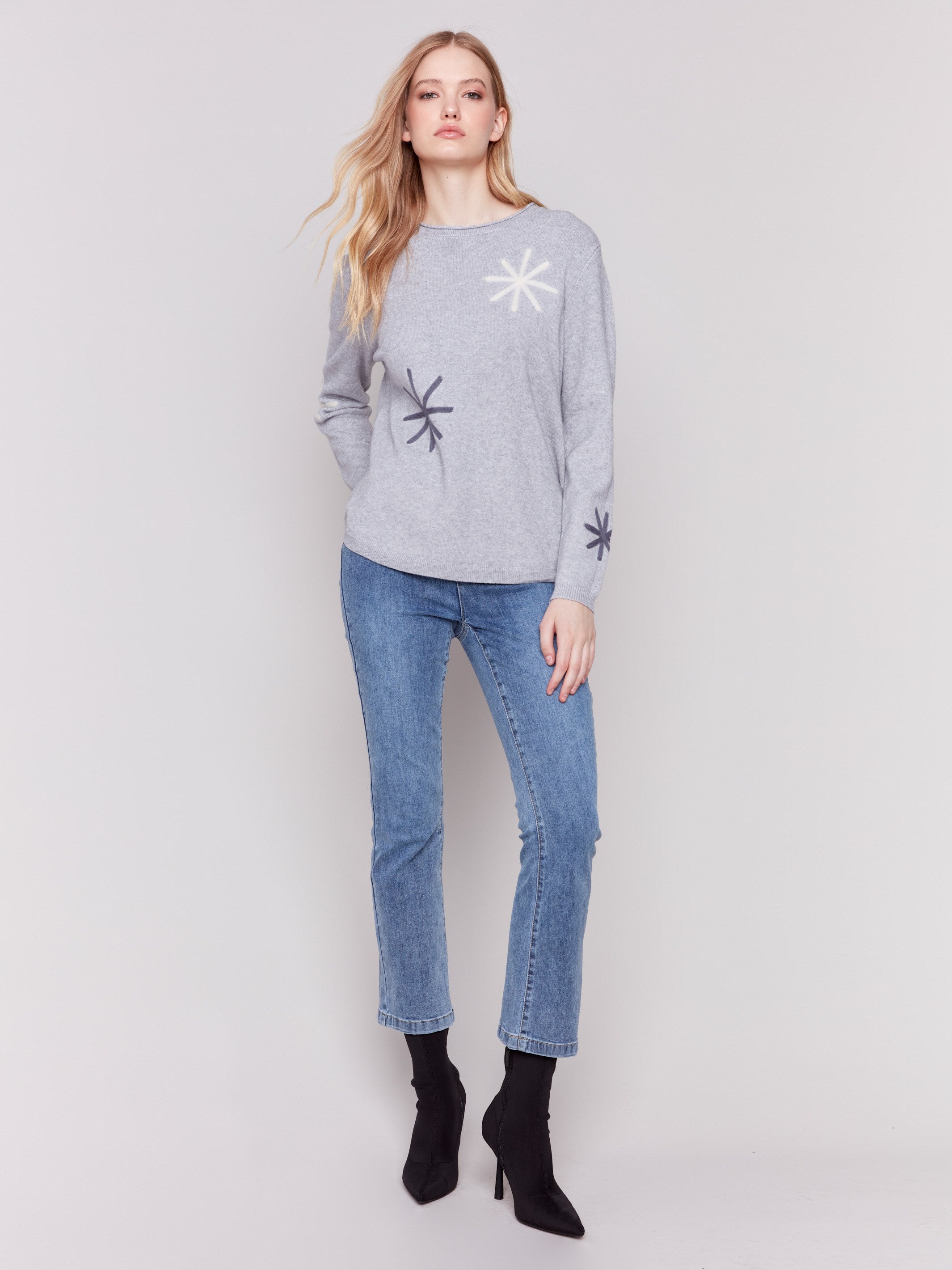 Light grey long-sleeve sweater with snowflake embroidery and rounded hem by Charlie B.