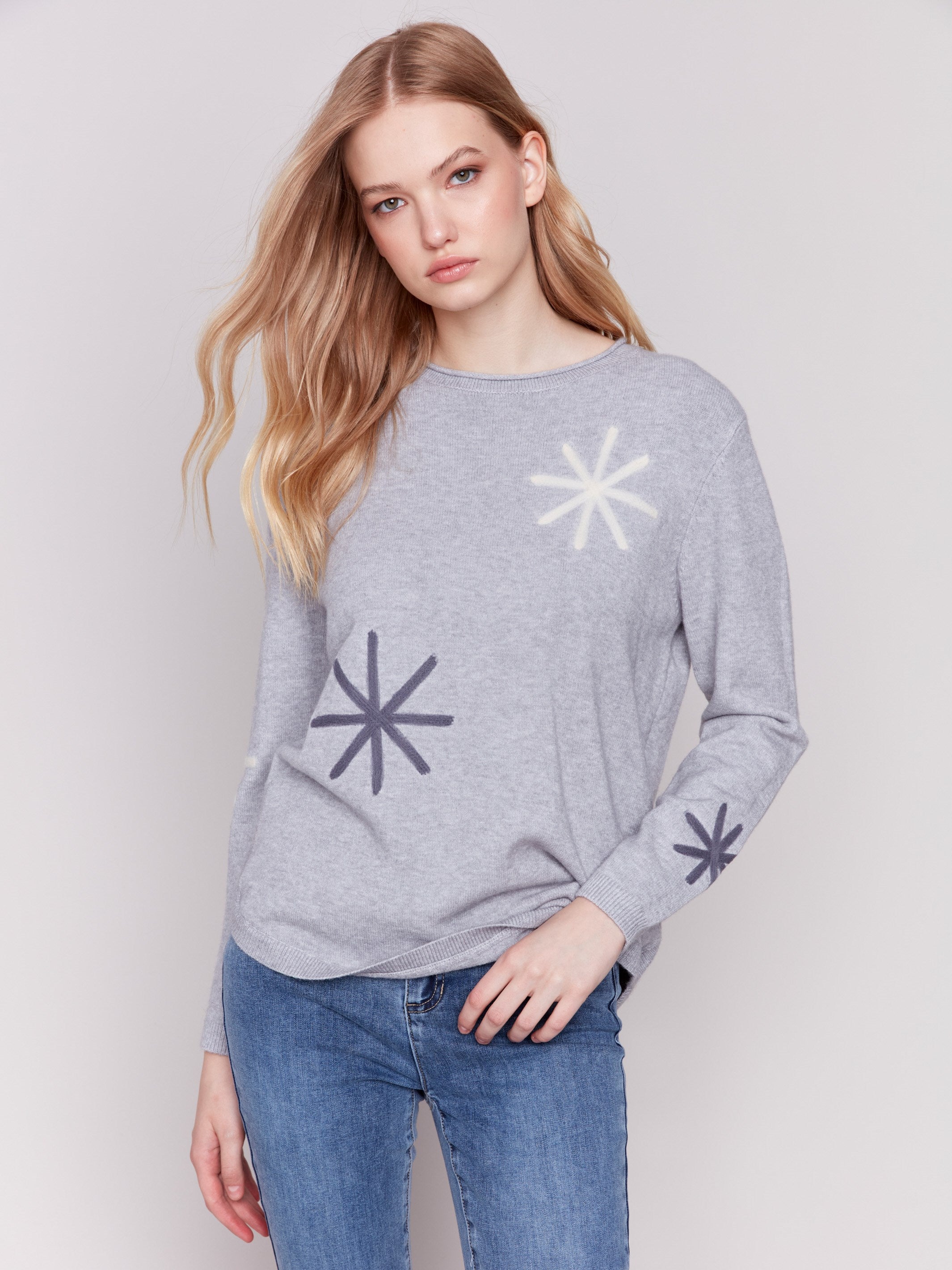 Light grey long-sleeve sweater with snowflake embroidery and rounded hem by Charlie B.