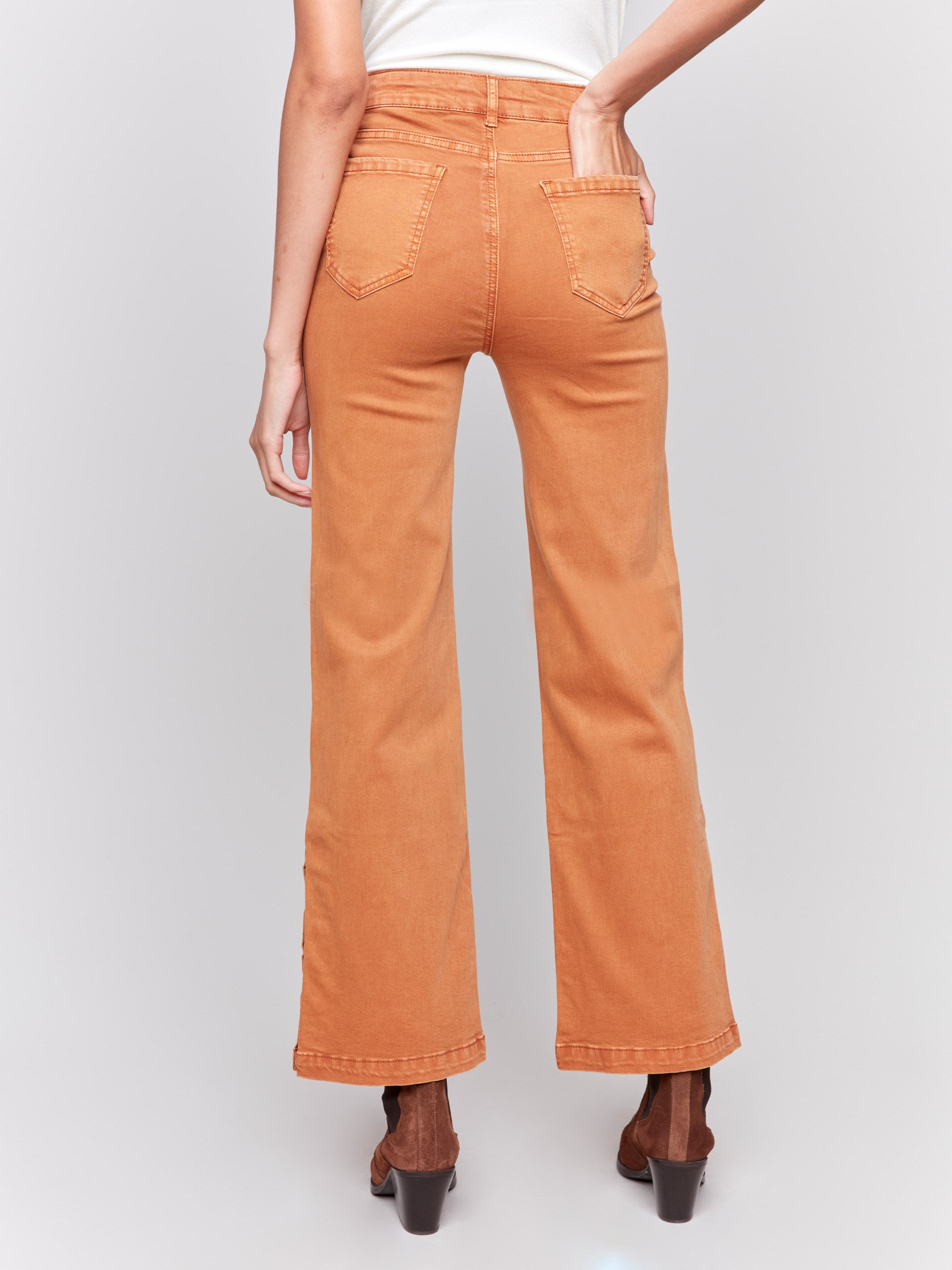 Ginger-colored flare twill jeans with side buttons, featuring a regular rise, five-pocket design, and slim leg fit by Charlie B.