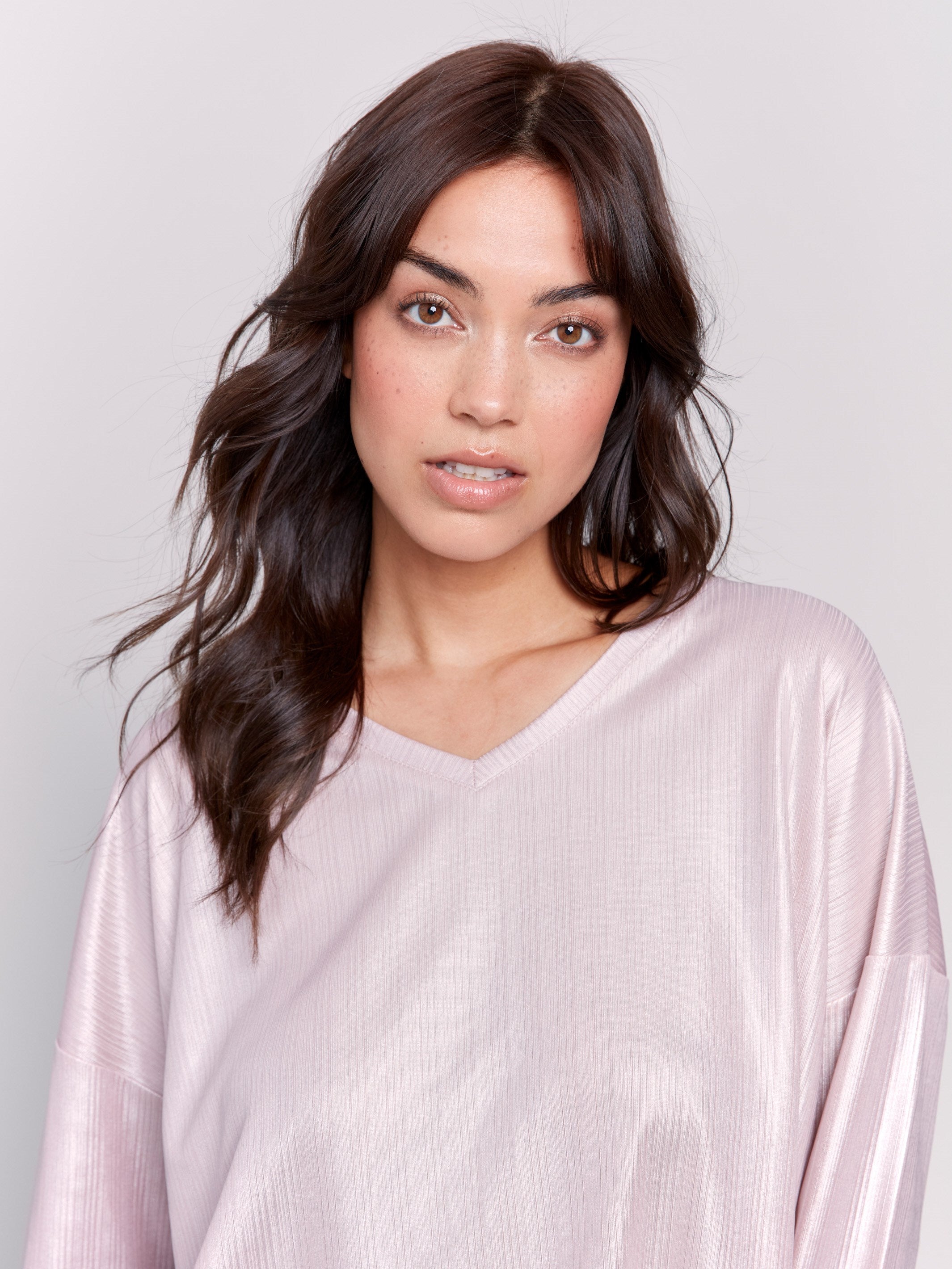 Long-sleeve, foiled-knit V-neck top in a shiny quartz pink color by Charlie B.