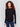 Black long-sleeve sweater with a crew neck and frayed rounded hem by Charlie B.