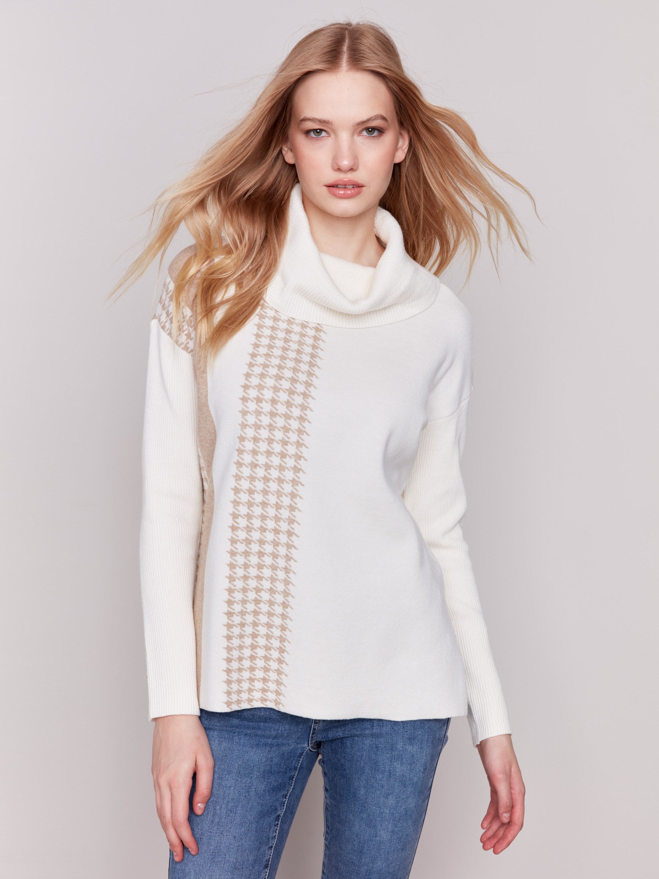 Ecru sweater with a houndstooth stripe, featuring a cowl neck and side slit by Charlie B.