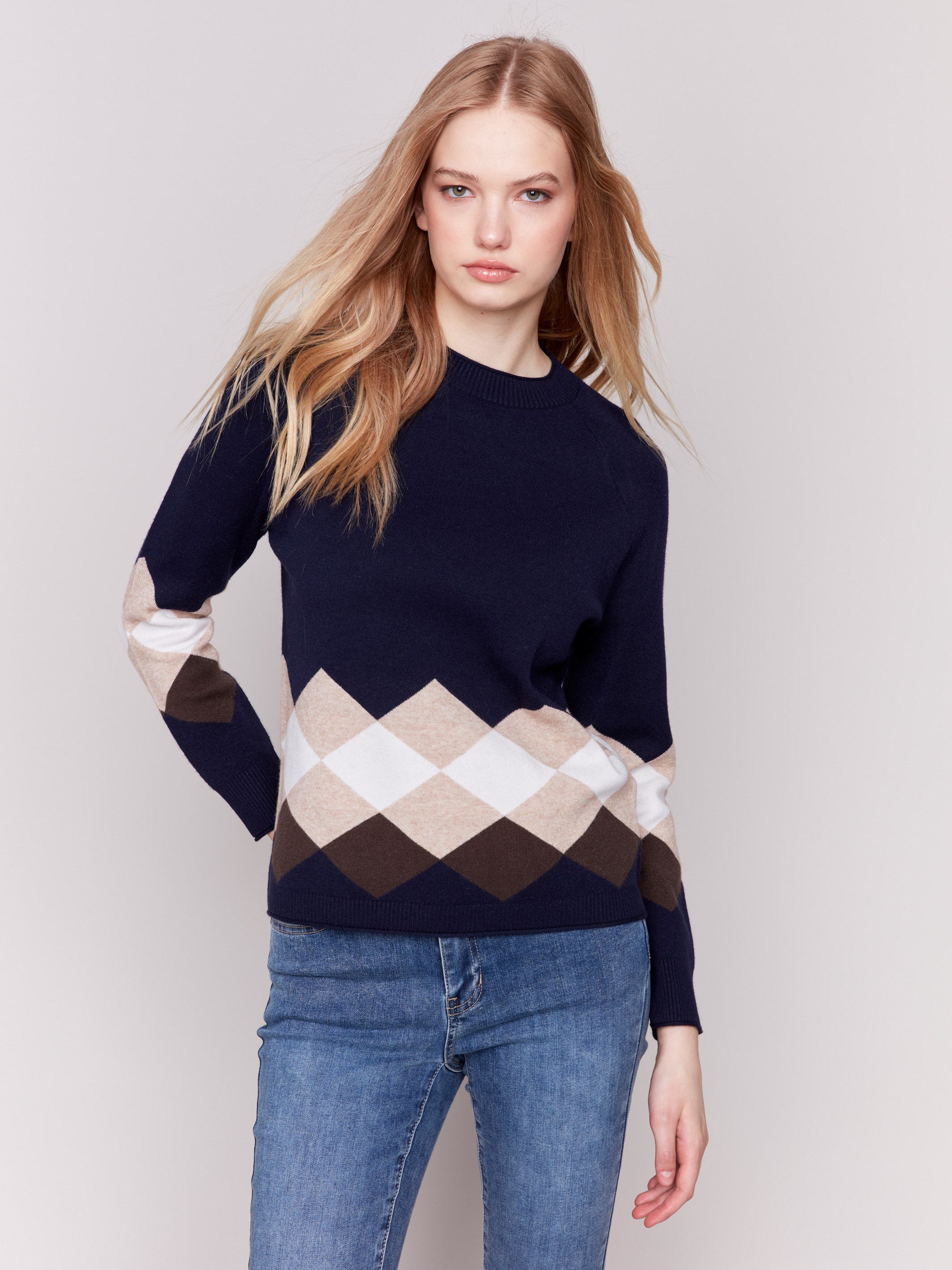 Navy blue argyle knit sweater with raglan sleeves, featuring a crew neckline by Charlie B.