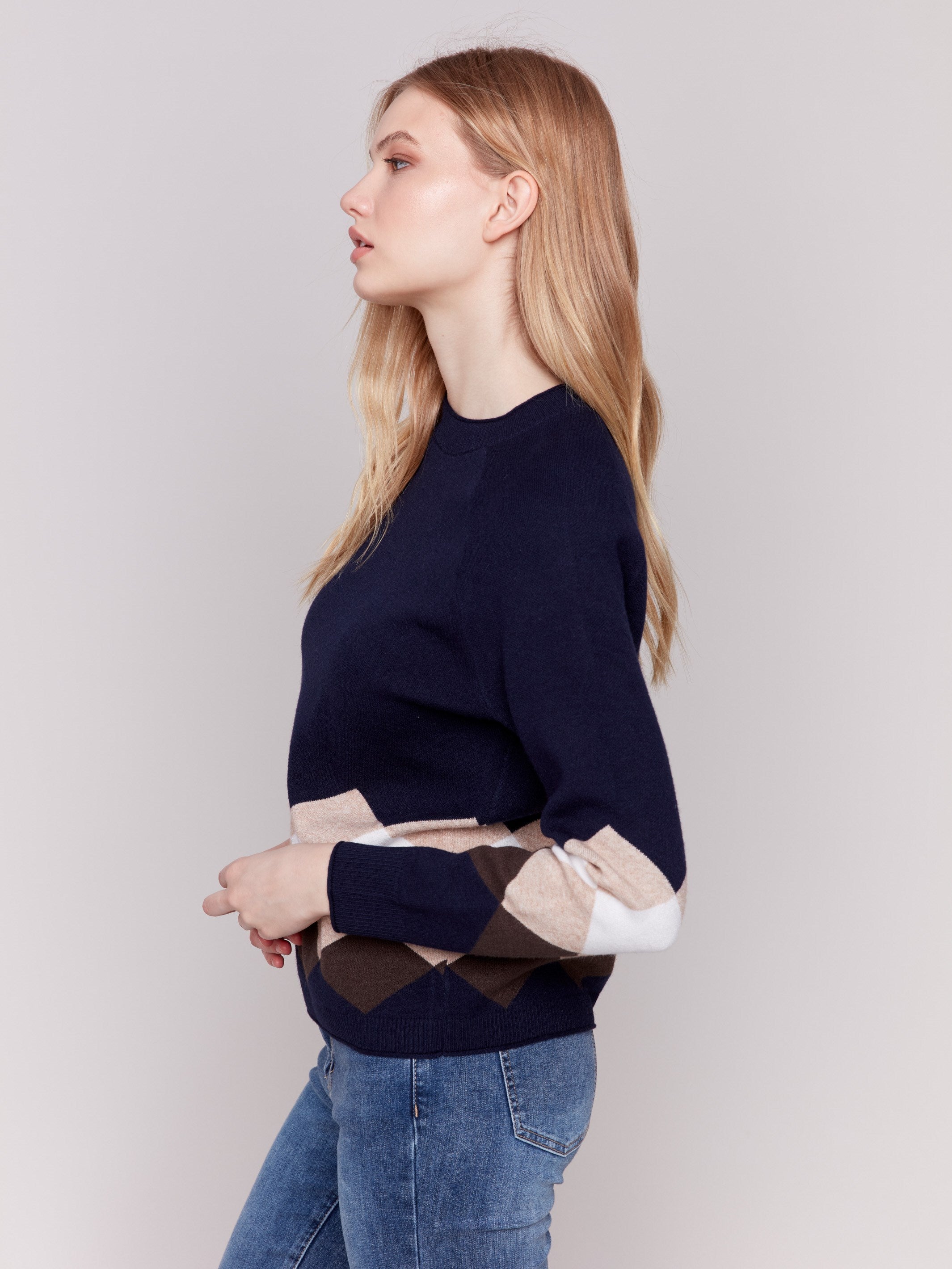 Navy blue argyle knit sweater with raglan sleeves, featuring a crew neckline by Charlie B.