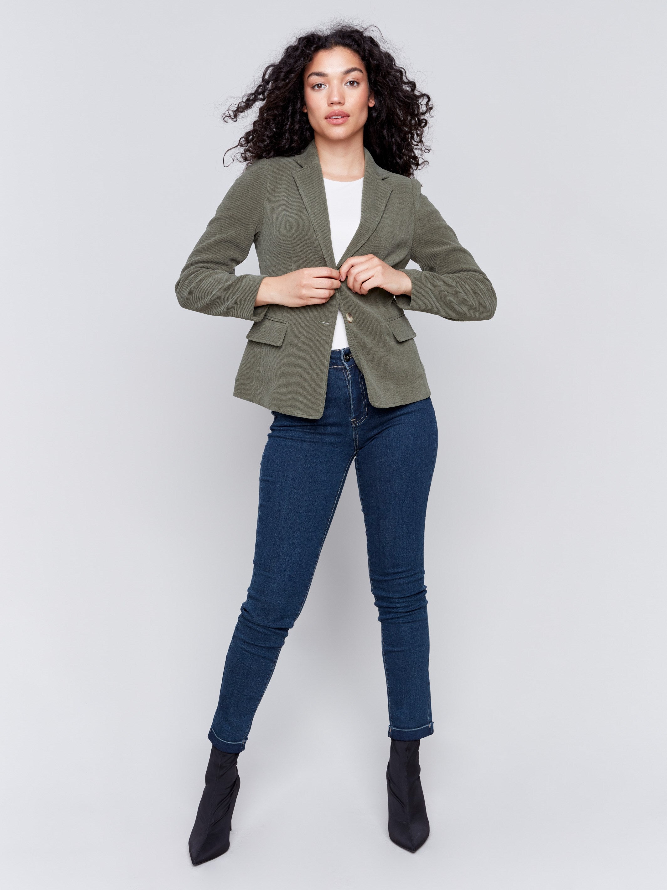 Olive green corduroy blazer with a single-button closure and flap pockets by Charlie B.