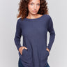 Dark blue knit sweater with a crew neckline, long ribbed sleeves, and back lace-up eyelet details by Charlie B.