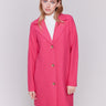 Magenta pink long wool coat with lapel notch collar and button closures, featuring front welt pockets by Charlie B.