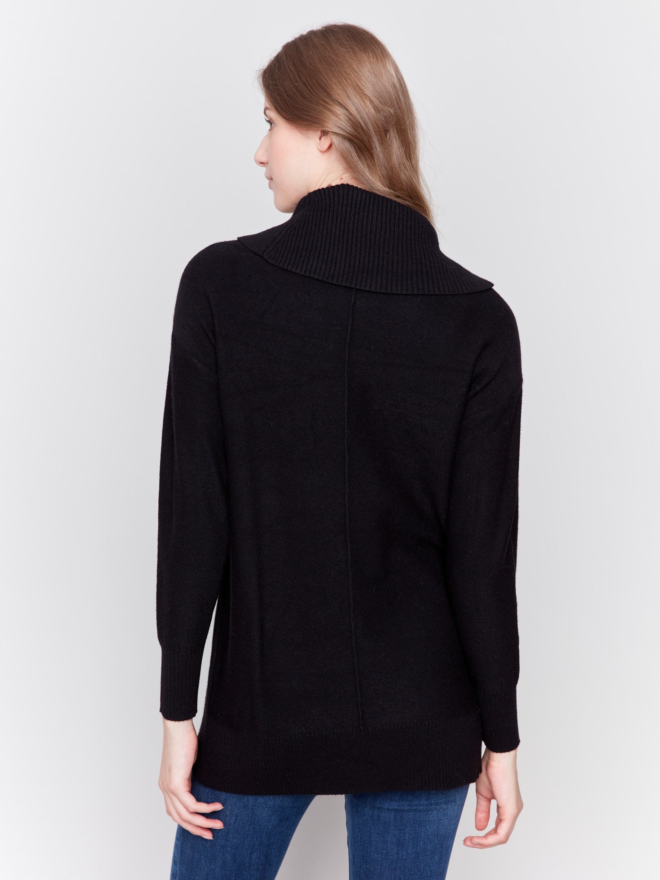 Elegant black long-sleeve sweater with cowl neck and side seams forward design by Charlie B.