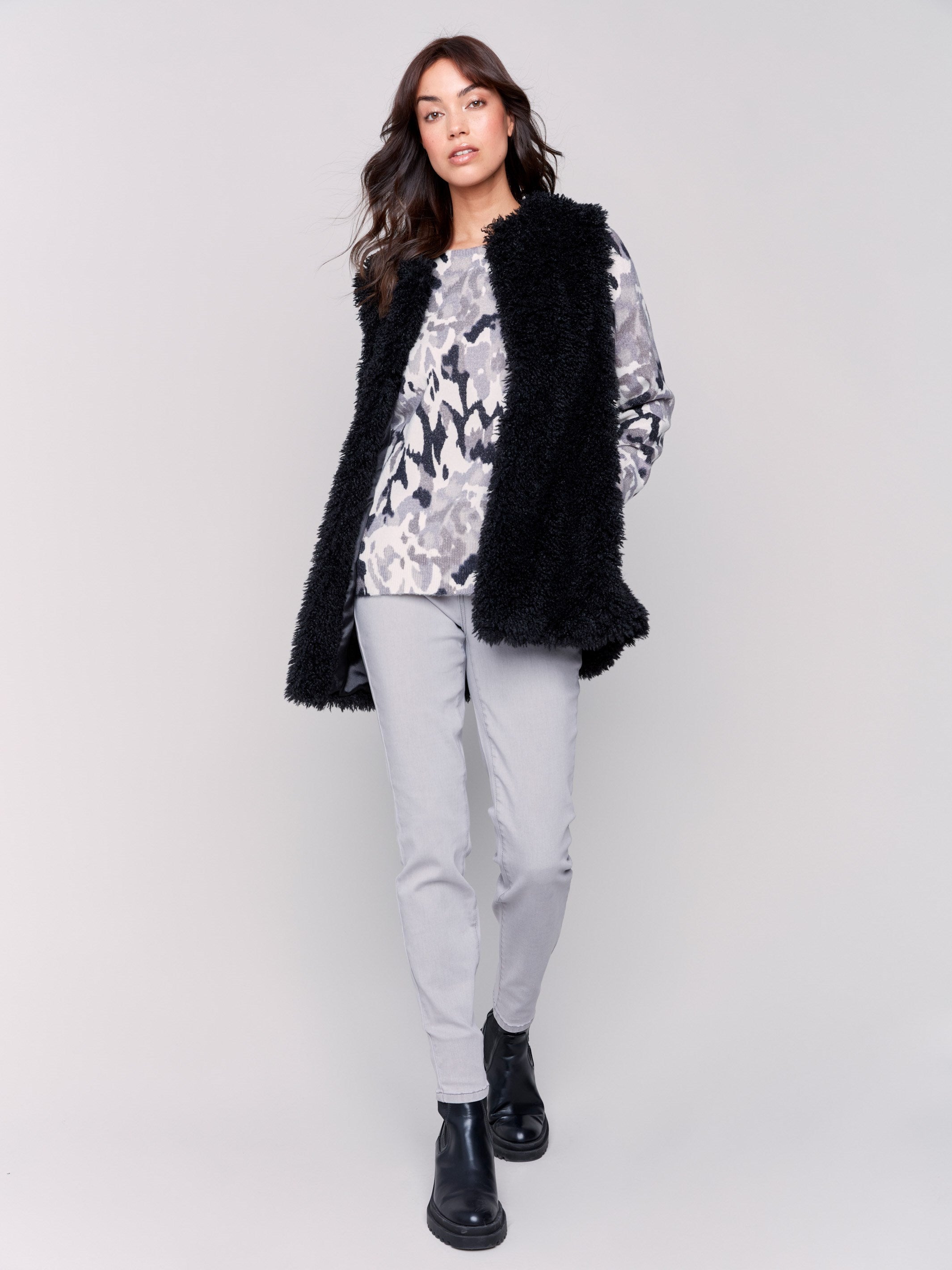 Black faux fur long vest without closure, featuring a soft and luxurious texture, perfect for a stylish and cozy look by Charlie B.