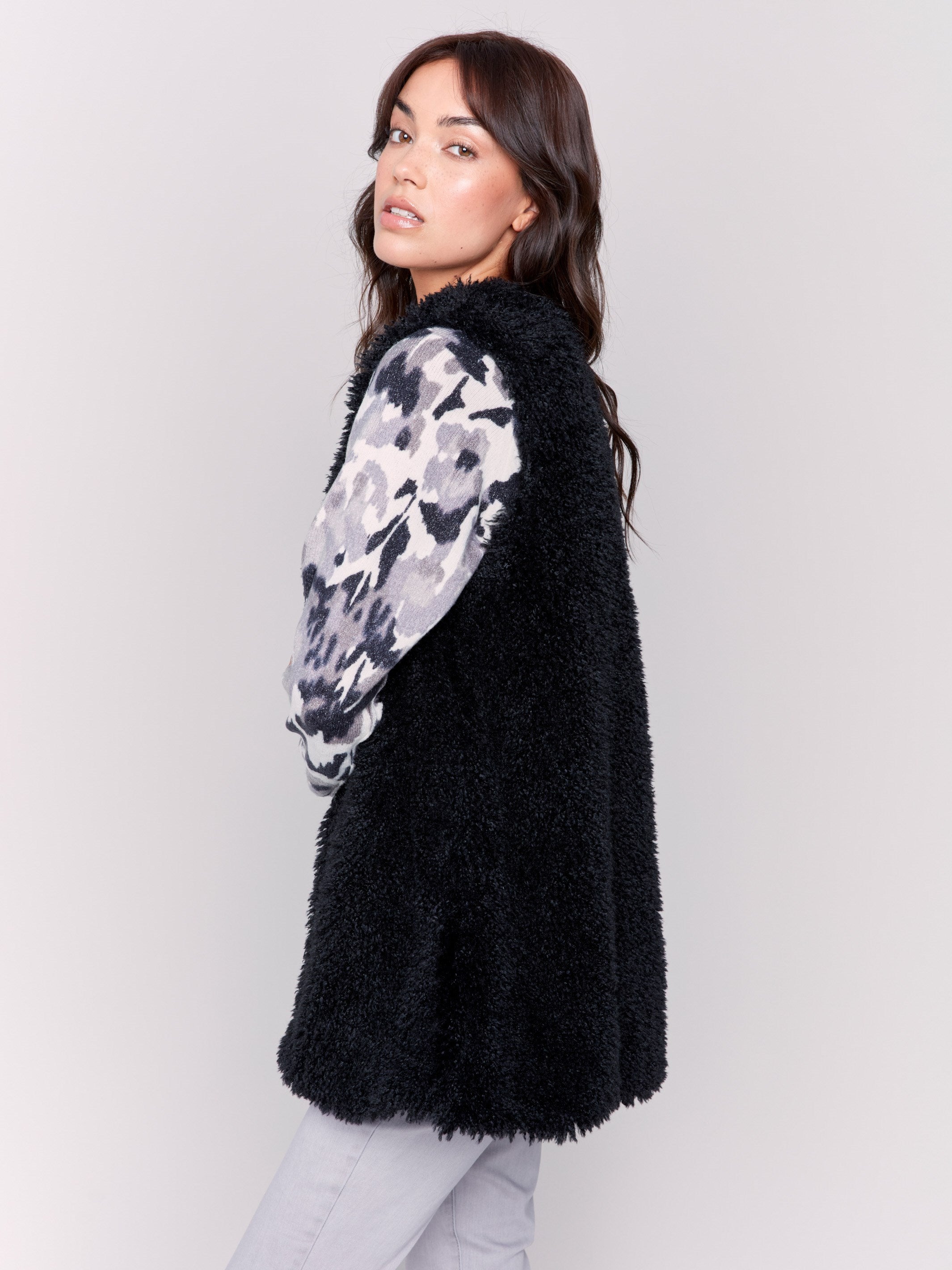 Black faux fur long vest without closure, featuring a soft and luxurious texture, perfect for a stylish and cozy look by Charlie B.