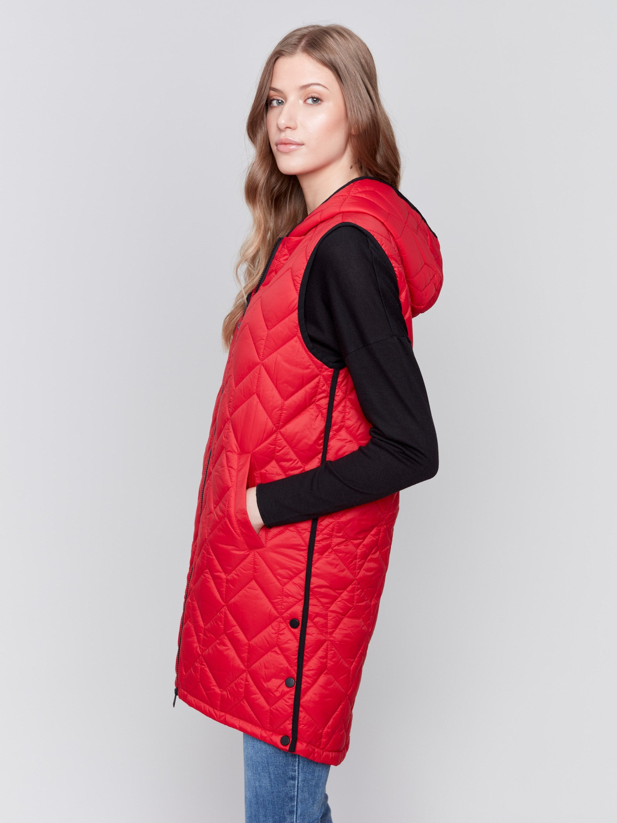 Cranberry red long quilted puffer vest with zip closure and hood by Charlie B.