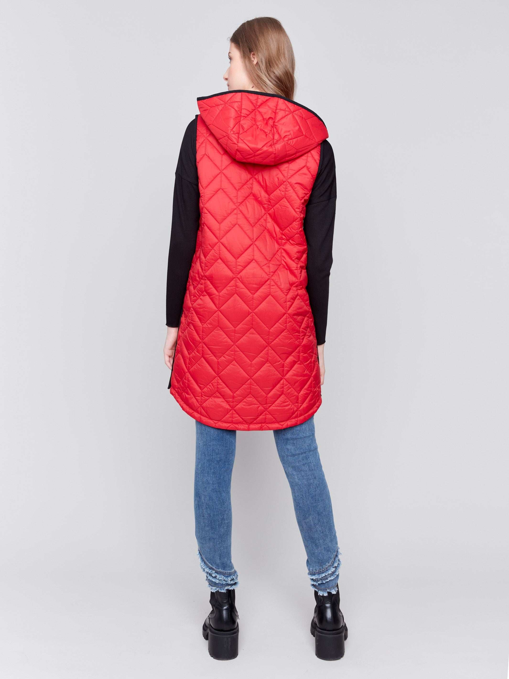 Cranberry red long quilted puffer vest with zip closure and hood by Charlie B.