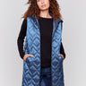 Navy blue long quilted puffer vest with hood and a zippered front by Charlie B.