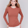 Terracotta long-sleeve top with crew neckline, featuring a fitted silhouette by Charlie B.