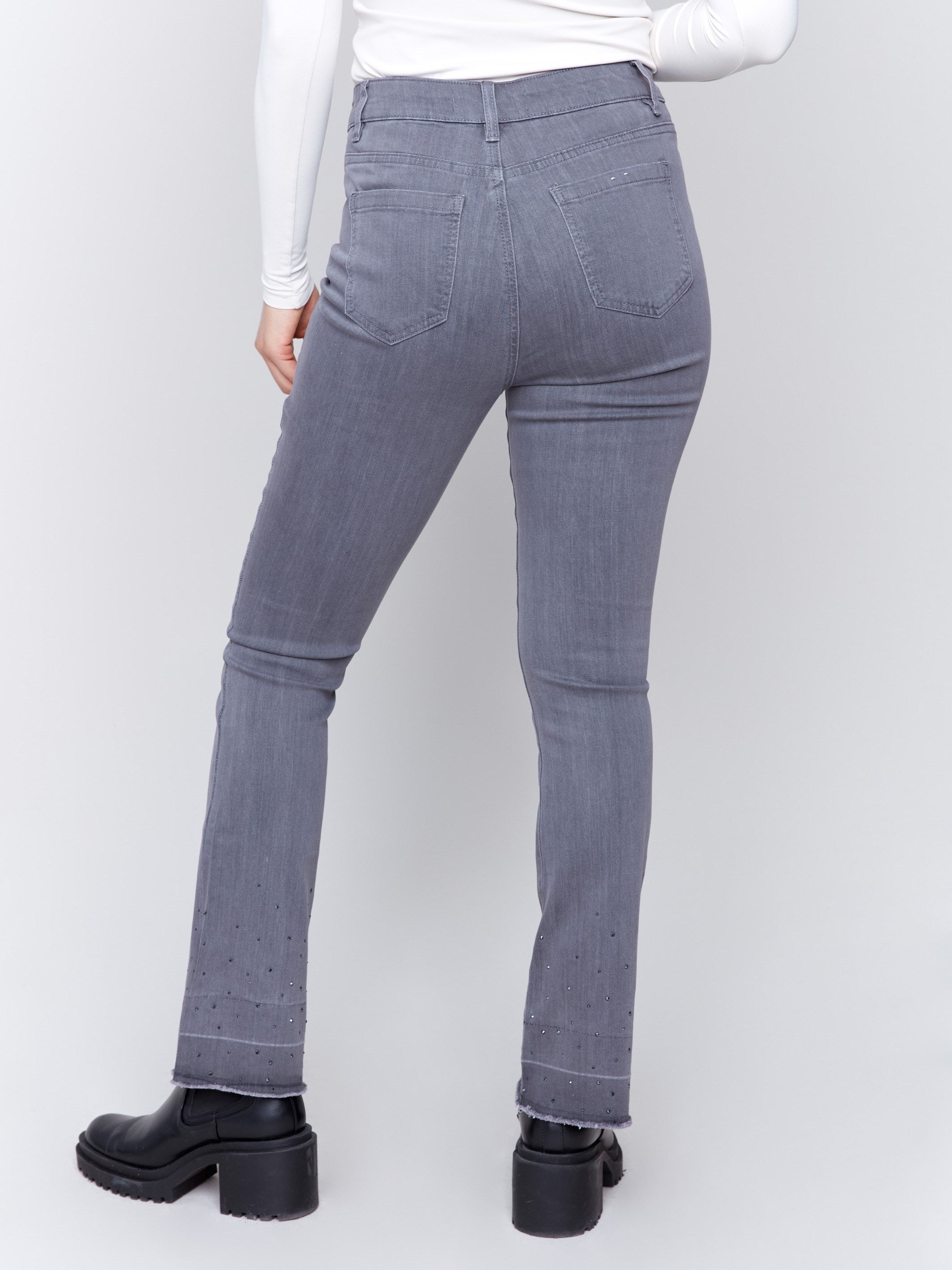 Medium grey flare jeans with ombre hem and stud detailing, featuring a five-pocket design and a regular rise by Charlie B.